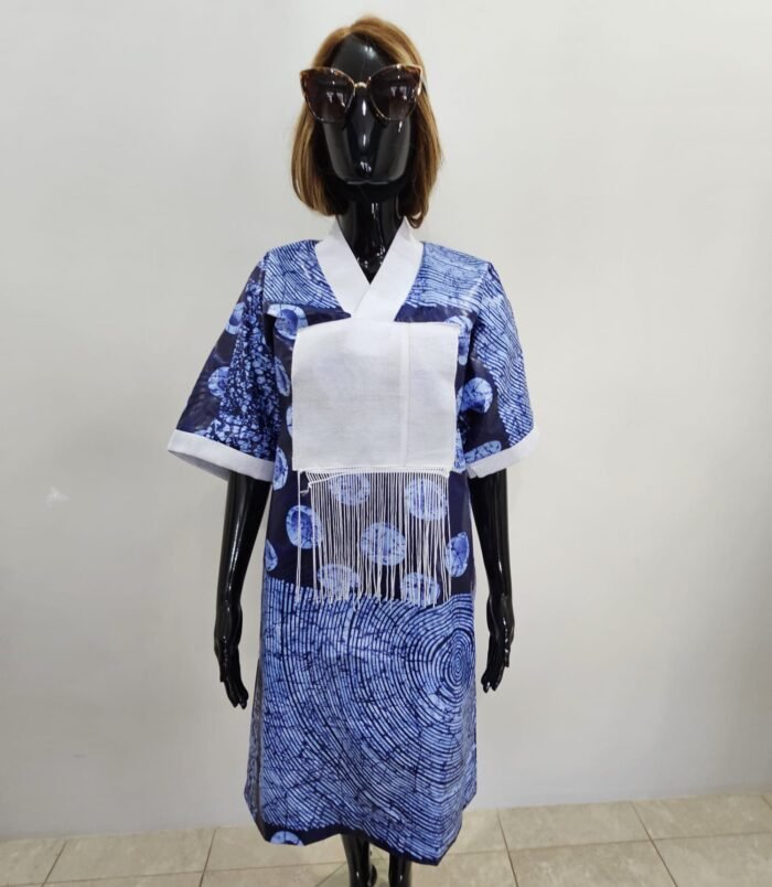 Mannequin wearing yellow and red afro women dress